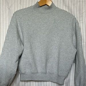 TNA mock neck sweater